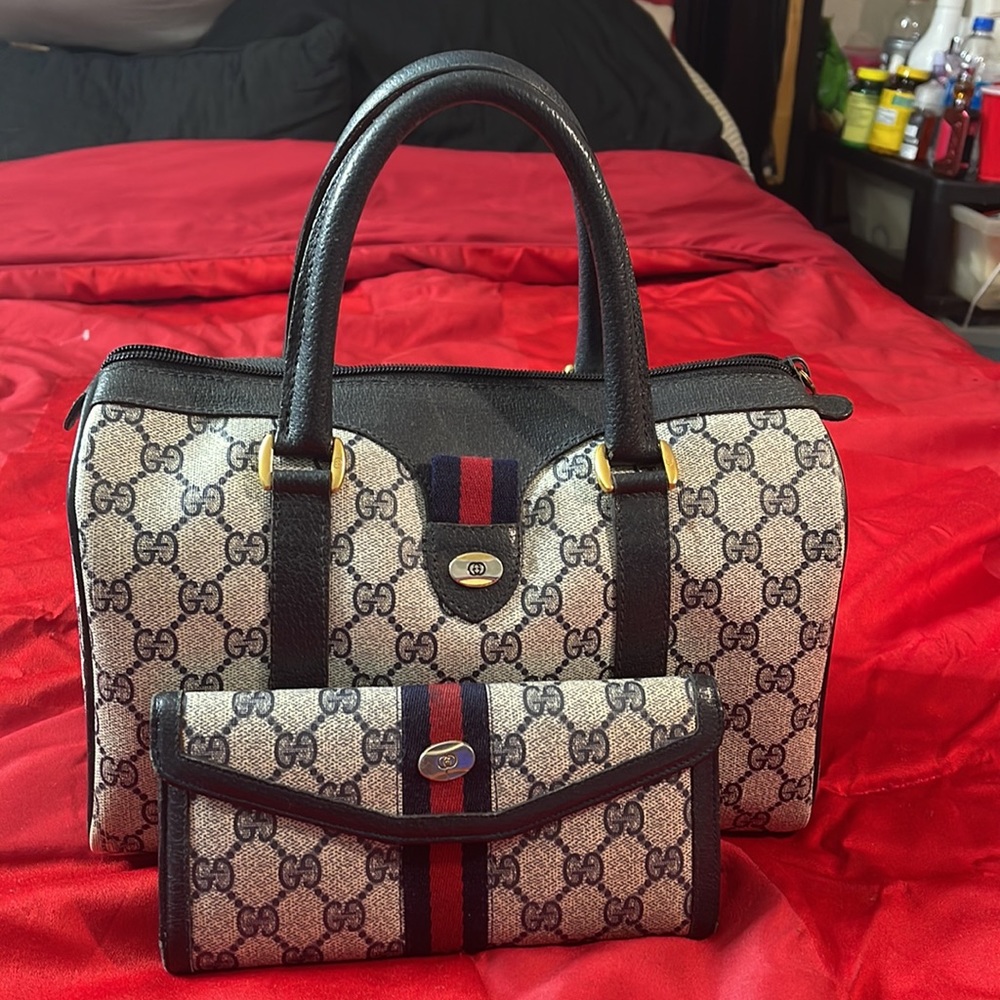 This is a beautiful rare Authentic Gucci handbag that have matching wallet.
